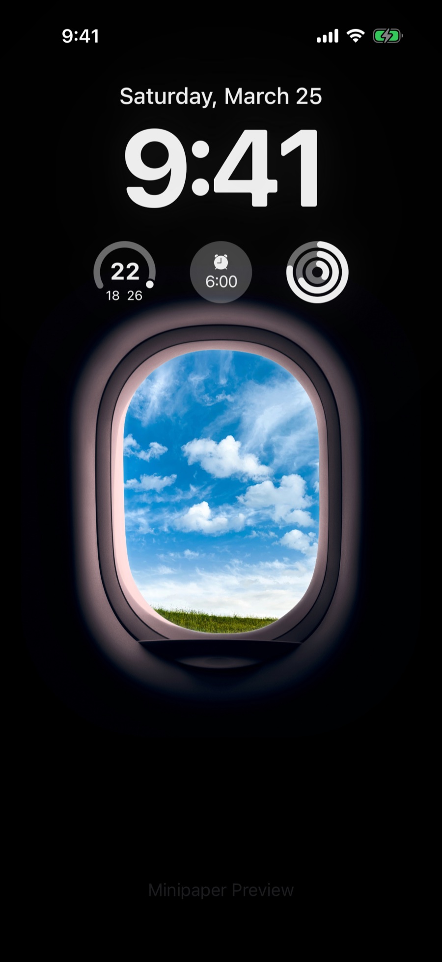 Airplane Mode wallpaper style in Minipaper on an iPhone Lock Screen