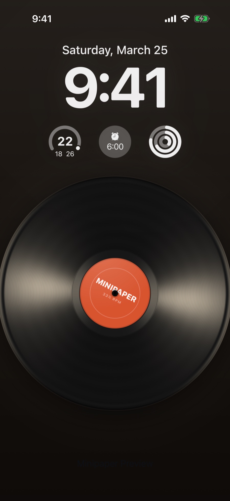Vinyl wallpaper style in Minipaper on an iPhone Lock Screen